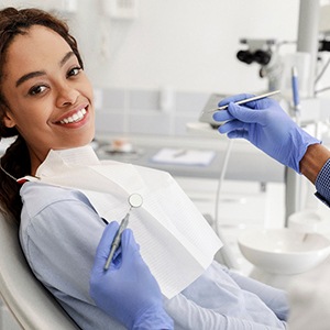Woman smiling while visiting Southbridge orthodontist