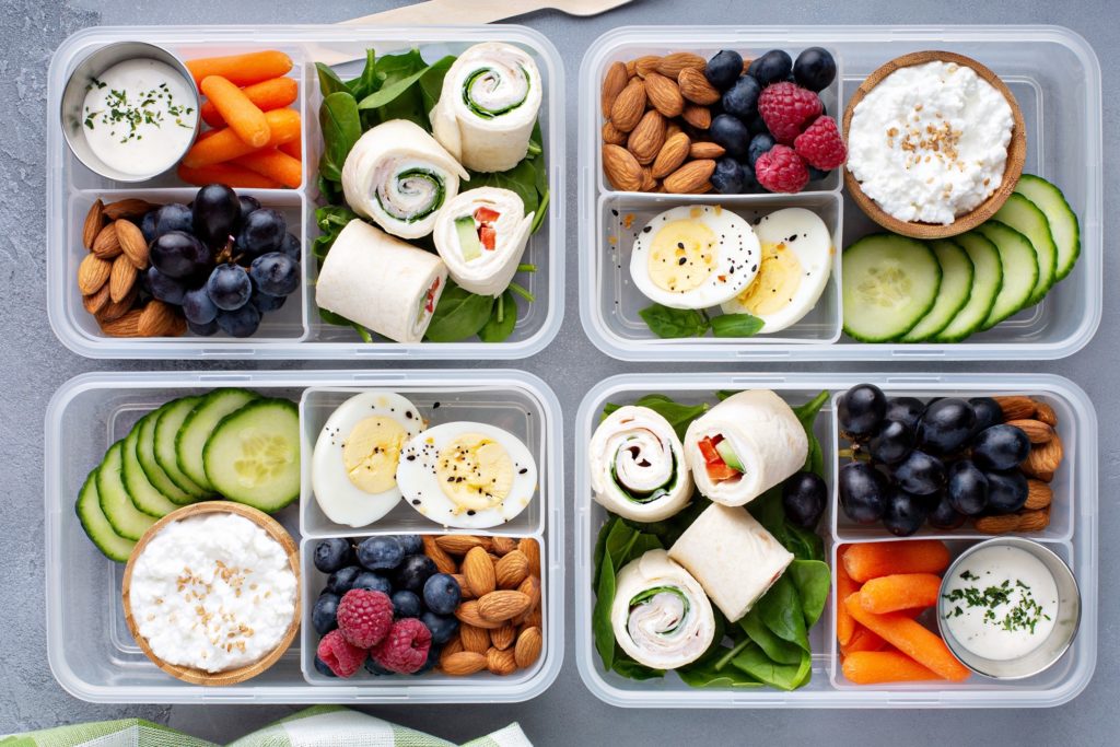 Aerial view of braces-friendly foods in containers